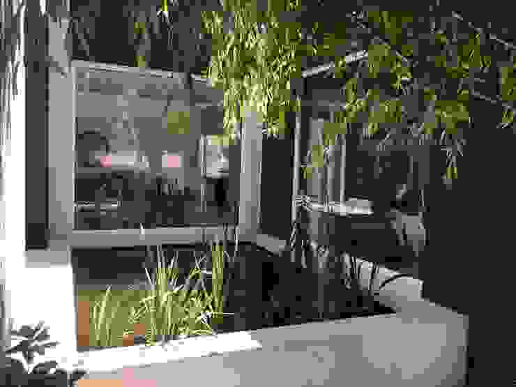 Casa FM, MFARQ - Tomas Martinez Frugoni Arq MFARQ - Tomas Martinez Frugoni Arq Modern garden