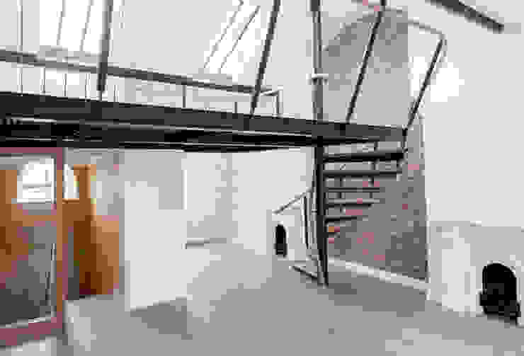 Spiral staircase to the mezzanine Railing London Ltd Modern corridor, hallway & stairs