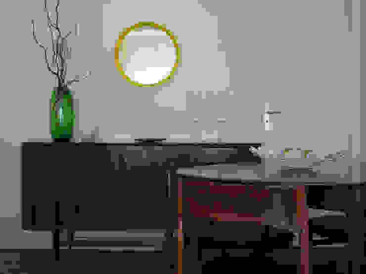 Eclectic style dining room by MUDA Home Design Eclectic