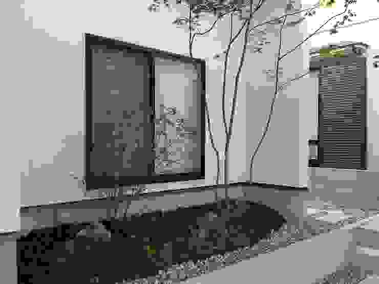 雑木が映えるモダンEXTERIOR, 株式会社 砂土居造園／SUNADOI LANDSCAPE 株式会社 砂土居造園／SUNADOI LANDSCAPE Modern garden Wood Green