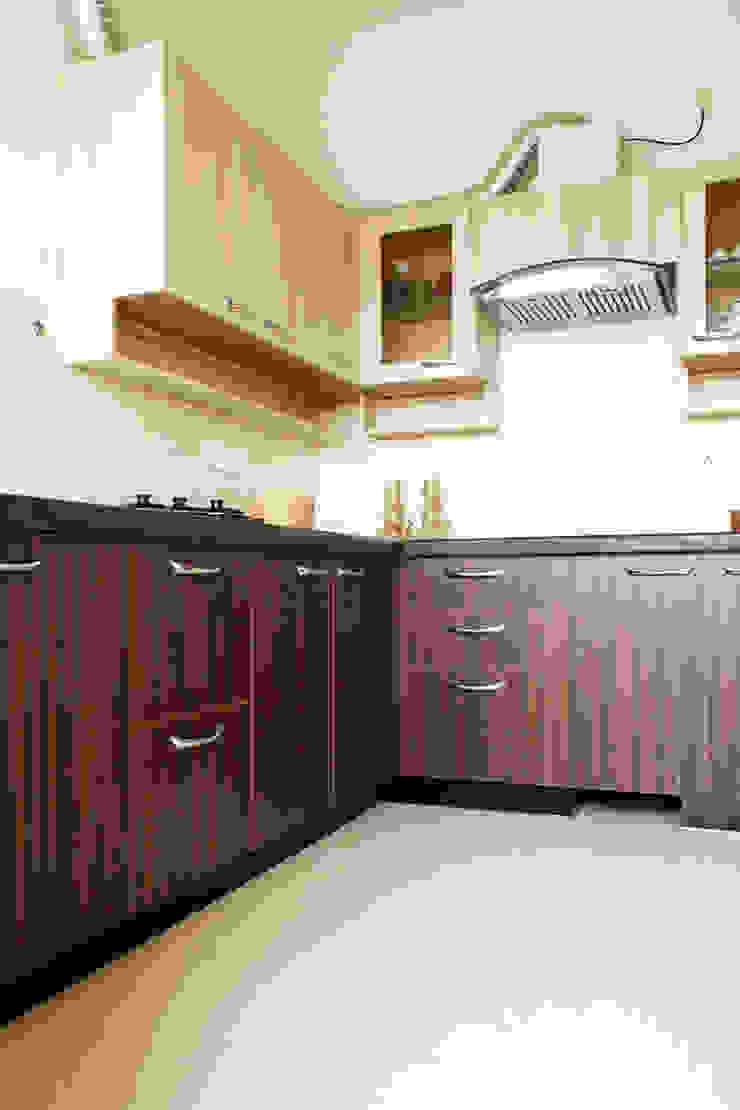Kitchen 2 Ashpra interiors KitchenCabinets & shelves Plywood