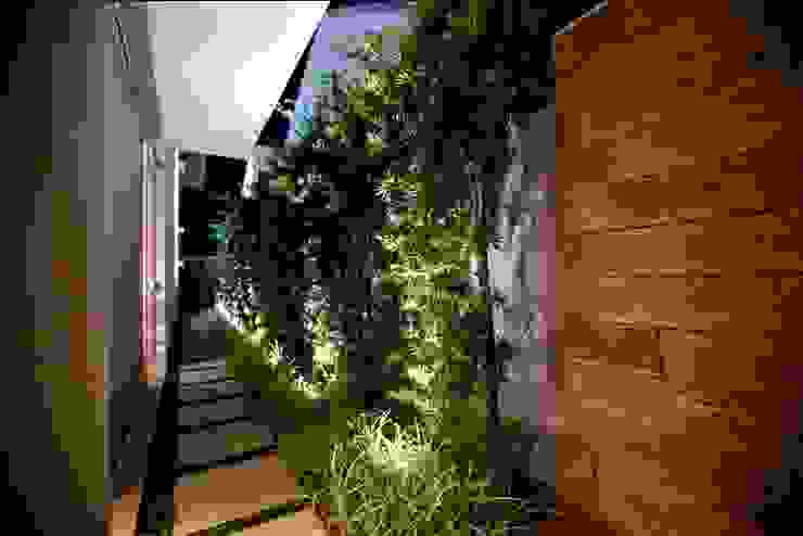 Residência Copacabana, Arquitetura Ao Cubo LTDA Arquitetura Ao Cubo LTDA Tropical style garden
