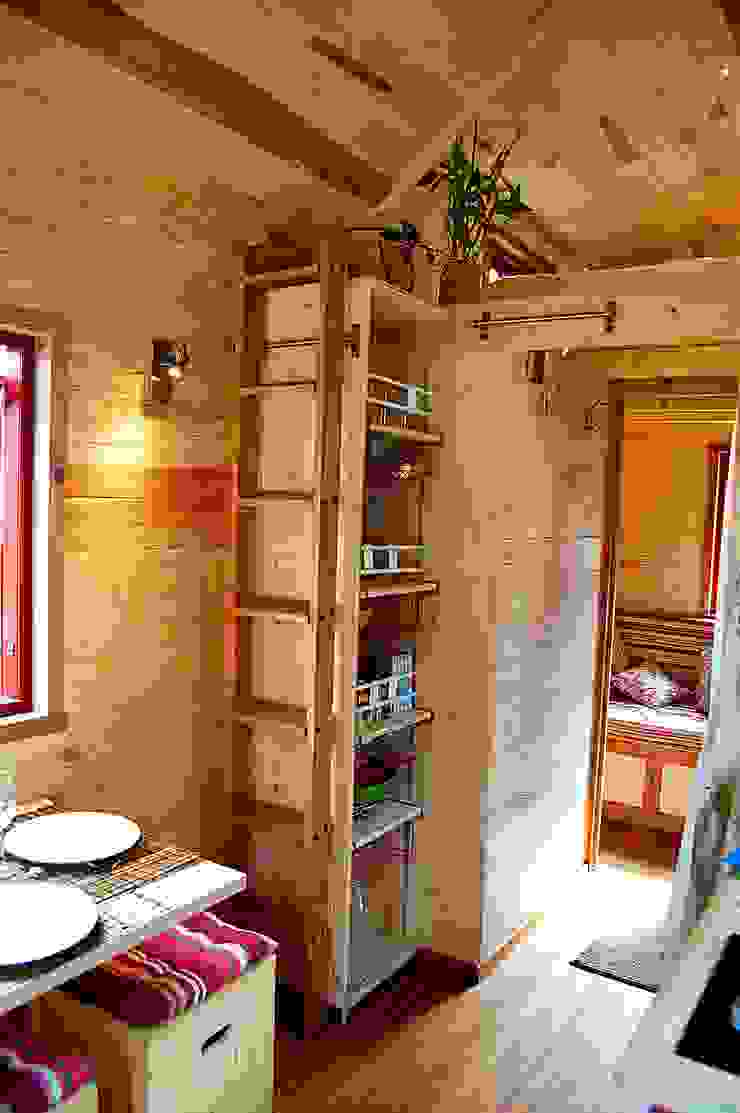 Eclectic style houses by TINY HOUSE CONCEPT - BERARD FREDERIC Eclectic