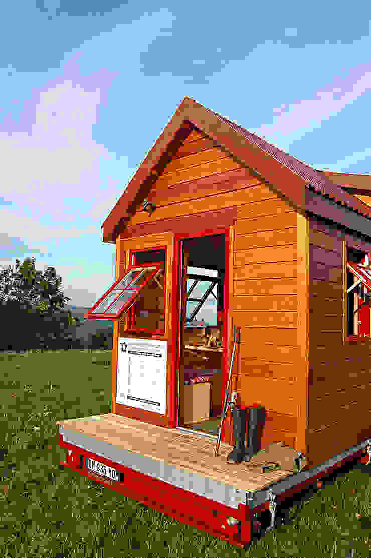 Eclectic style houses by TINY HOUSE CONCEPT - BERARD FREDERIC Eclectic