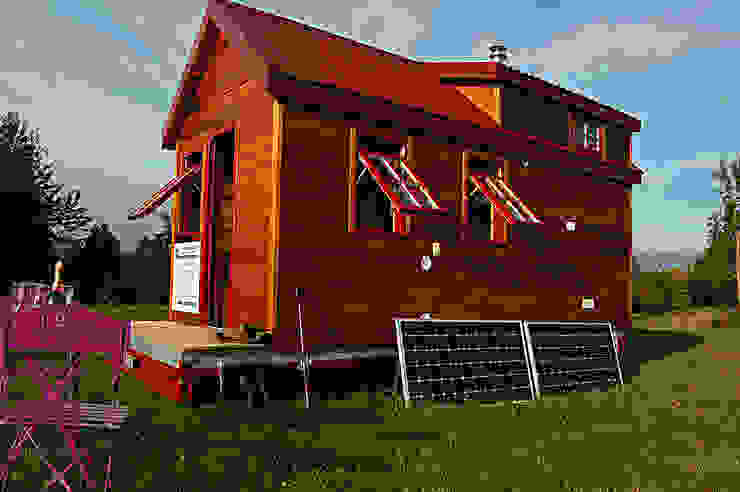 Eclectic style houses by TINY HOUSE CONCEPT - BERARD FREDERIC Eclectic