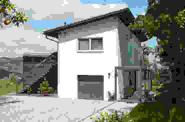 Casa prefabbricata in legno su progetto - Bifamiliare, Bologna, Spazio Positivo Spazio Positivo Modern Houses White