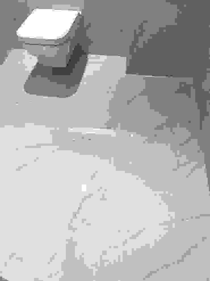 En Suite Bathroom With Carrara Marble Effect Porcelain Tiles Homify