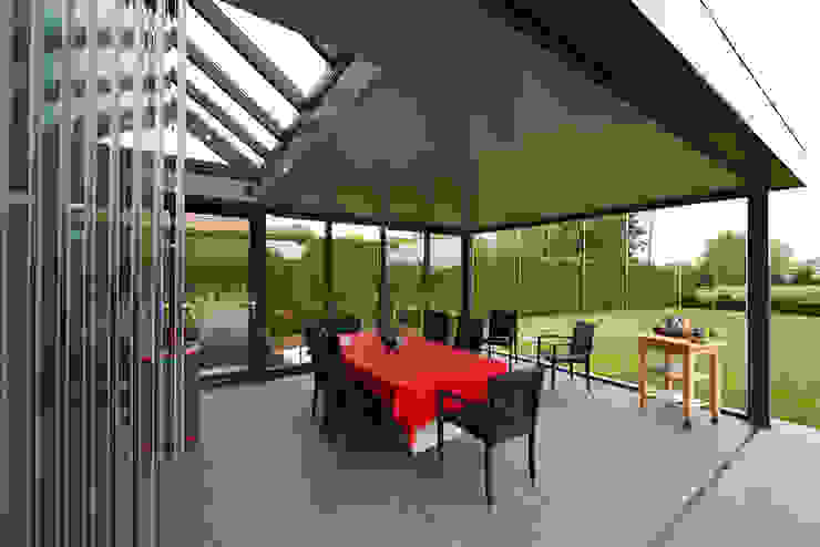 homify Moderner Wintergarten Glas