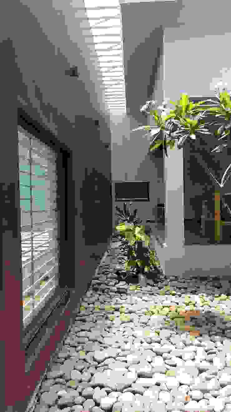 gandhi farm house 4th axis design studio Country style garden