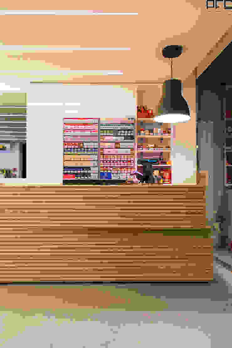 LOJA CONVENIÊNCIA DG 01_ESPOSENDE_2015 PFS-arquitectura Lojas e Espaços comerciais minimalistas