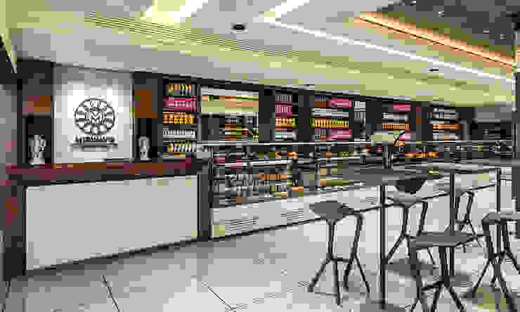 restaurant cum sweet shop by Square Designs | homify