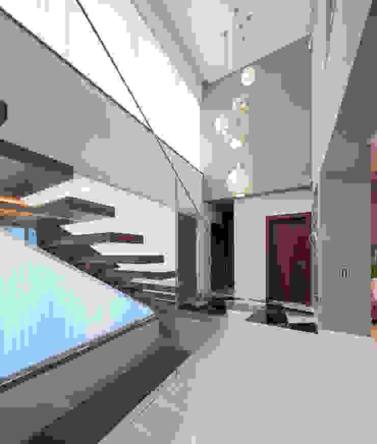 Moradia Algarve 2013 Atelier Ana Leonor Rocha Corredores, halls e escadas modernos