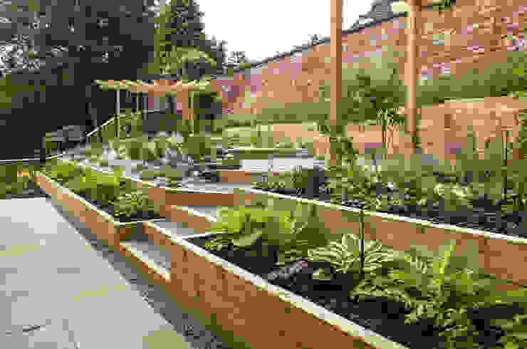 Modern Garden with a rustic twist Yorkshire Gardens Taman Modern sleepers,raised beds