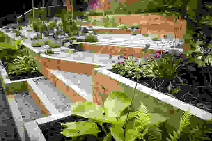 Modern Garden with a rustic twist Yorkshire Gardens Modern garden raised beds,sleepers