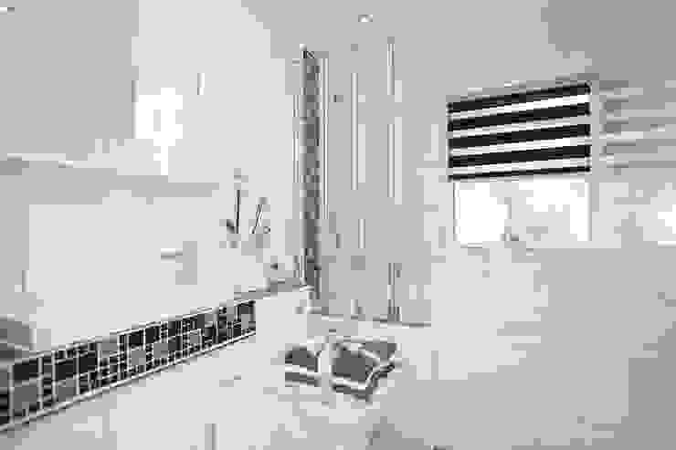 Bathroom After by Millennium Interior Designers