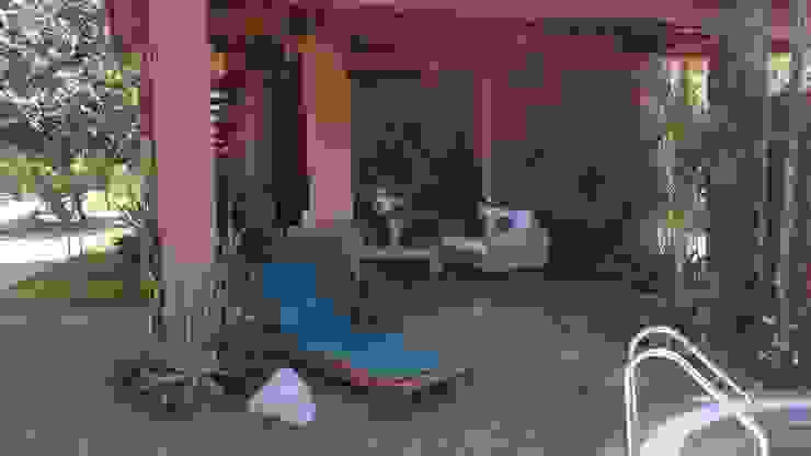 Cervantes Bueno arquitectura Вітальня Камінь Дерев'яні