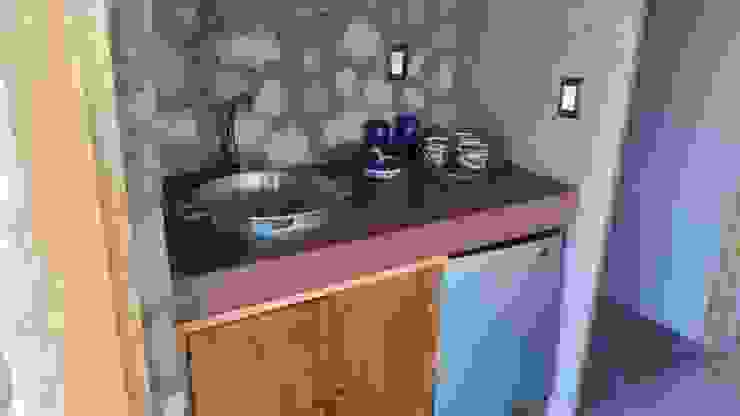 Cervantes Bueno arquitectura Кухня Камінь Дерев'яні