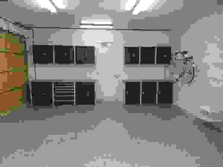 Resin Floor, Metal Cabinets and Bike Storage Galore in this lovely garage makeover in Cambridge Garageflex Moderne Garagen & Schuppen Grau garage,built-in storage,fitted,storage,garage door,metal,cabinet,cupboard,wall paneling,floor,resin,bike