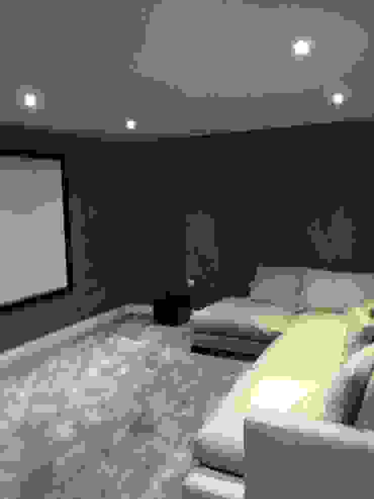 Cinema Room with bespoke suede fabric walls Designer Vision and Sound Sala multimediale moderna