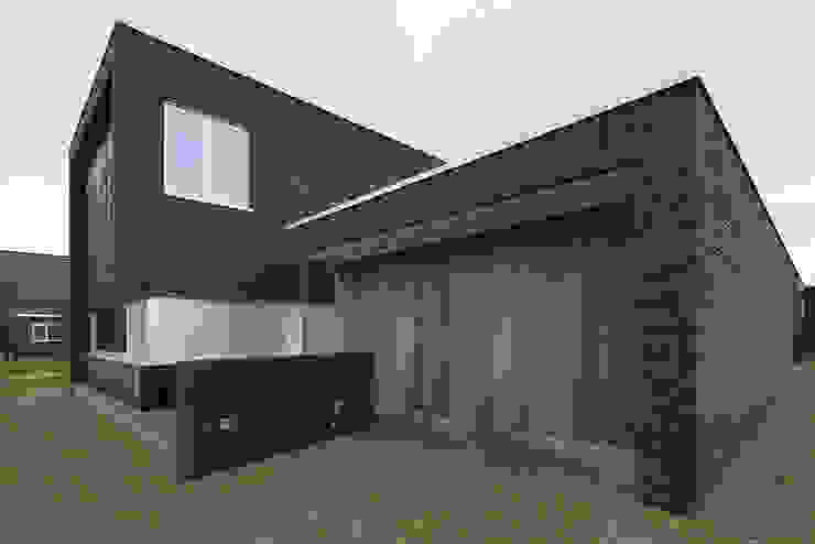 Backstein und Holz modern interpretiert | homify