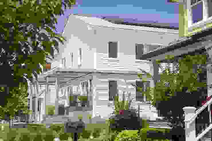Southern elevation with solar electric system ZeroEnergy Design Classic style houses White