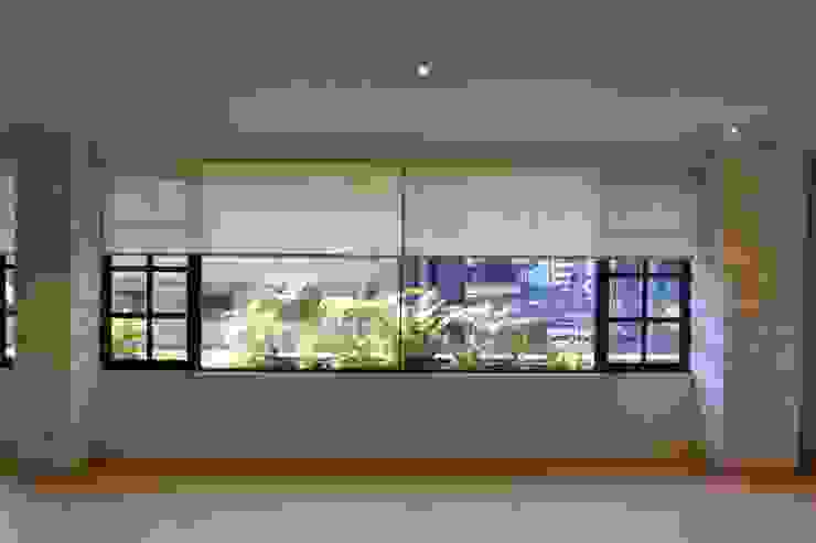 Garage Interiorismo y Diseño Будинки