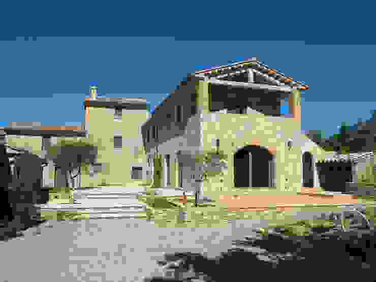 marco carlini architetto Country style house Stone Amber/Gold