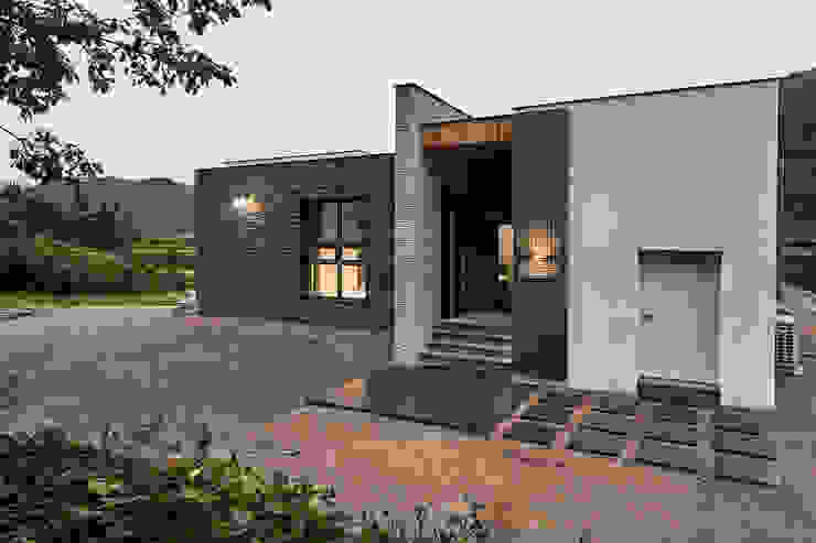 Una moderna casa con fachada de piedra ¡Perfecta para tu familia! | homify