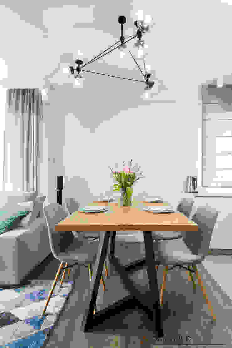 Salas de jantar modernas por Q2Design Moderno