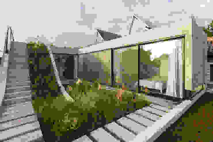 BAM! arquitectura Modern style balcony, porch & terrace Concrete Grey