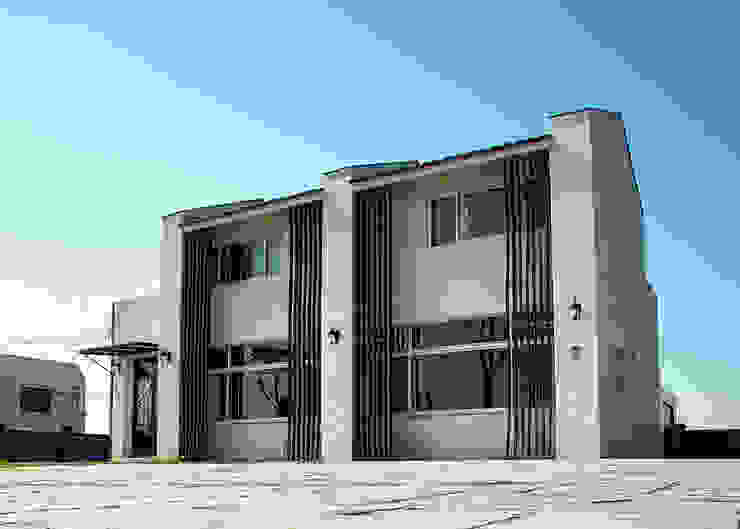 Glocal Architecture Office (G.A.O) 吳宗憲建築師事務所/安藤國際室內裝修工程有限公司 Nowoczesne domy