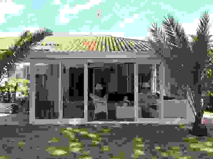 Cerramiento de patio exterior con cortinas de cristal homify