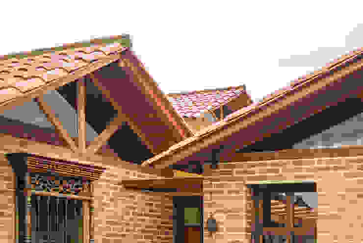 Una casa de ladrillo familiar y repleta de notas tropicales | homify