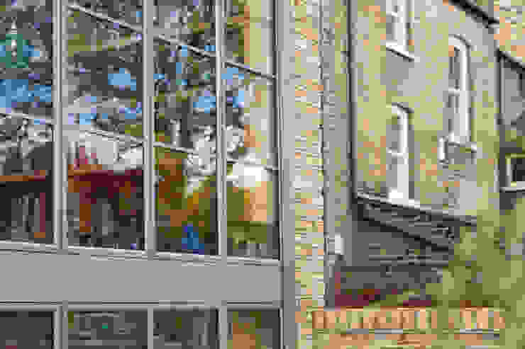 Double height crittall style extension HollandGreen 에클레틱 주택