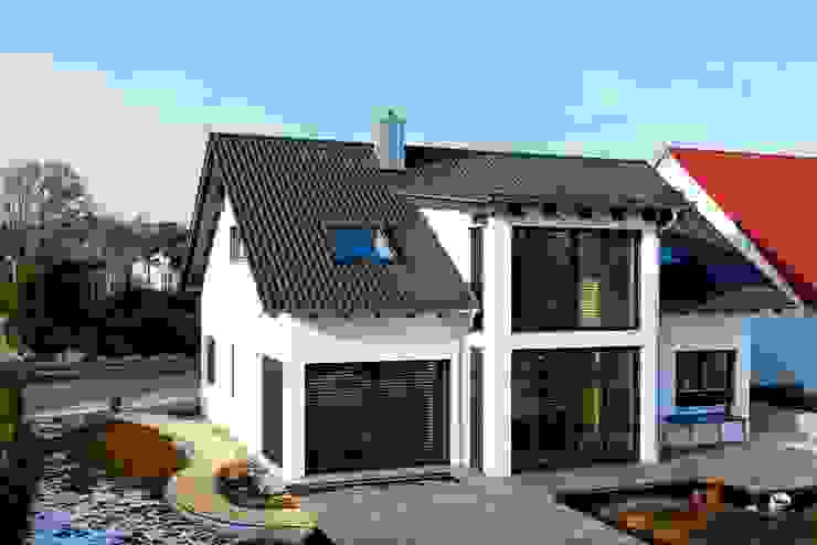 homify Houten huis Hout Wit