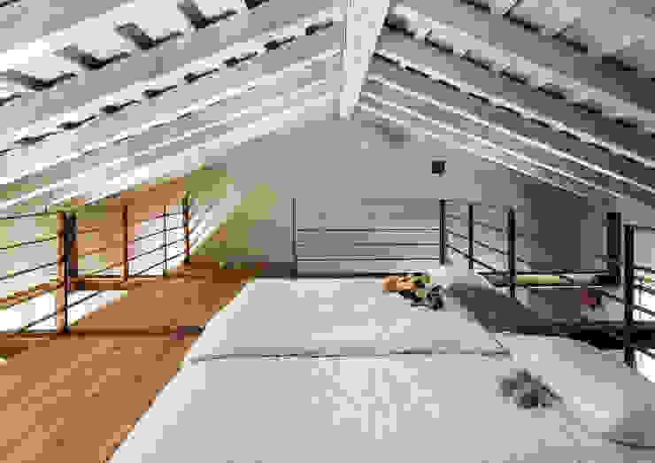 zanon architetti associati Dormitorios de estilo rural