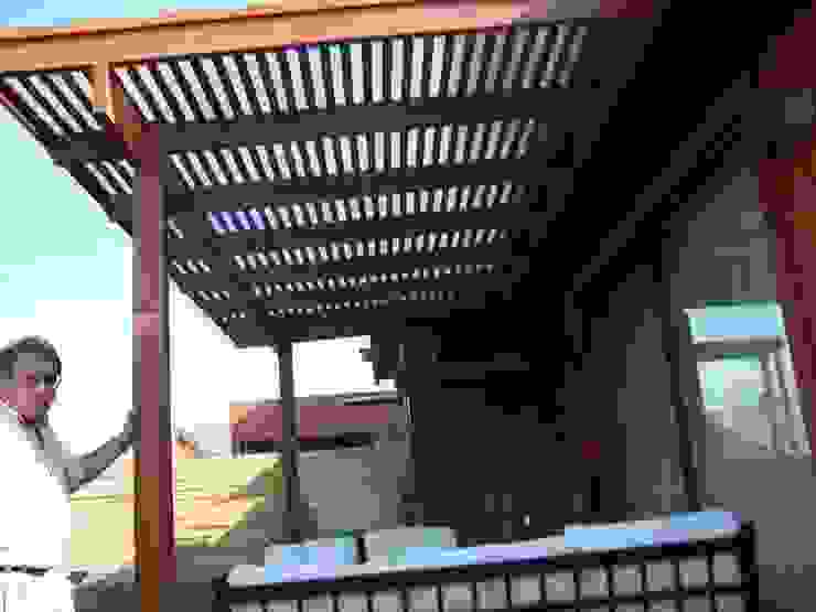 ¿Cómo construir una pérgola para la terraza? Con listones de madera