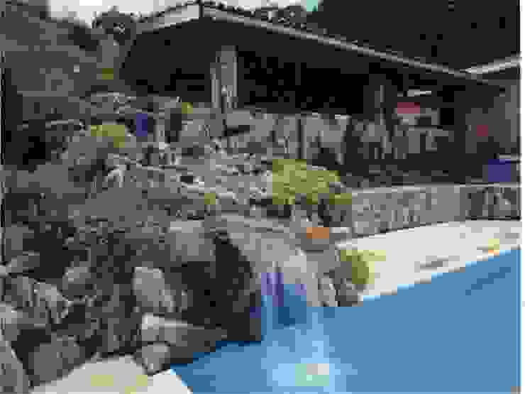 Construcao De Cascata De Pedra Em Piscina Homify