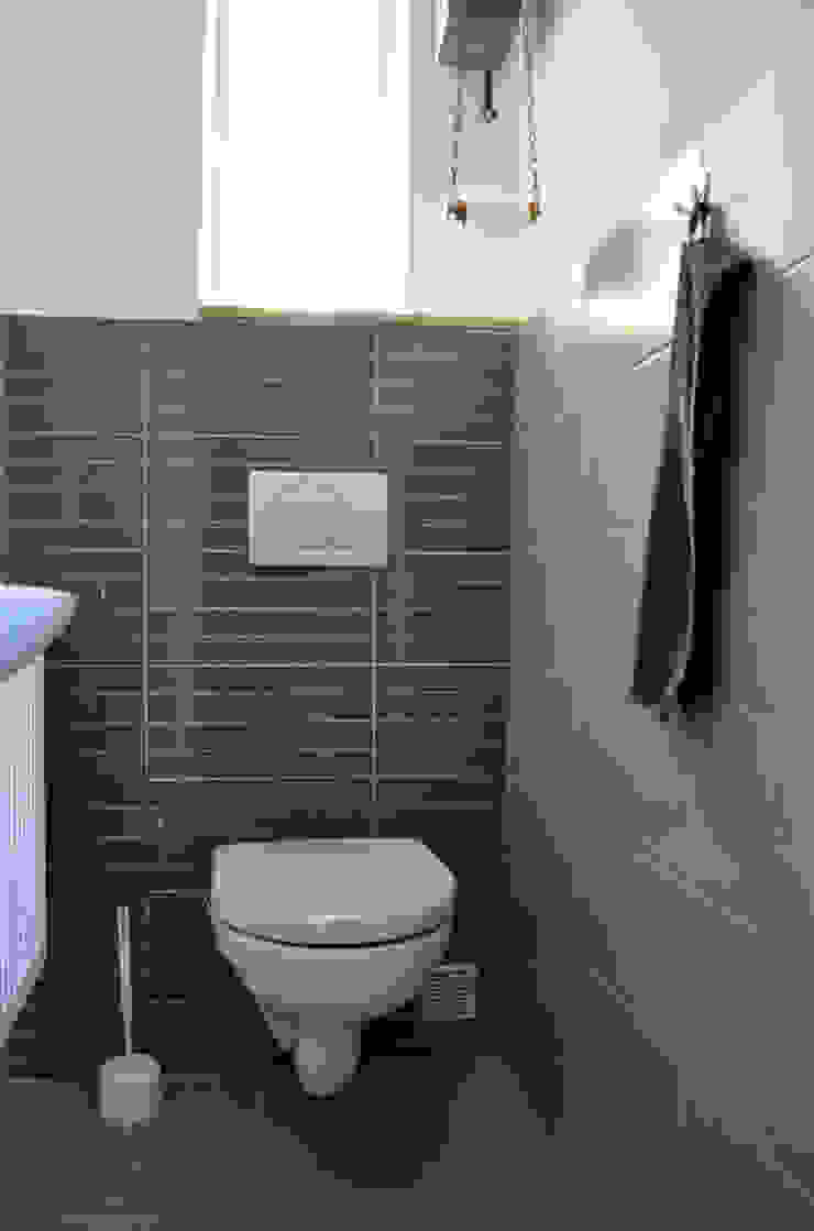 Ferienwohnung Interiordesign & Styling Moderne Badezimmer Beton Grau Toilette,Gästewc,Beton,grau