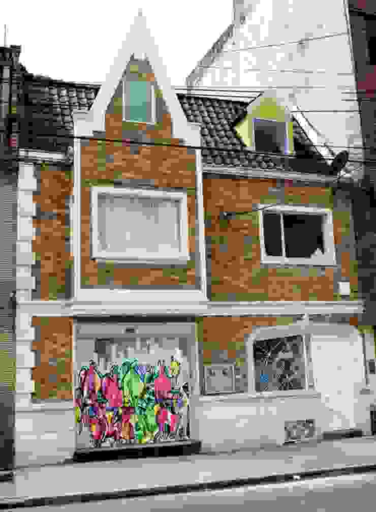 Fachada tratada homify Casas modernas despues,casa antigua,restauracion