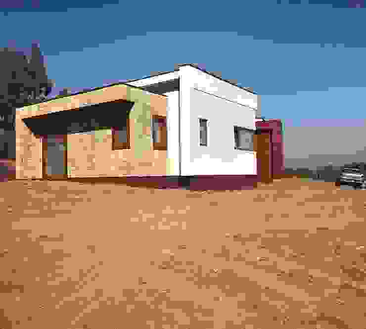 Fachada lateral. Vivienda Lt37 Premium 125m2 Fundo Loreto Territorio Arquitectura y Construccion - La Serena Casas unifamiliares Compuestos de madera y plástico Acabado en madera arq