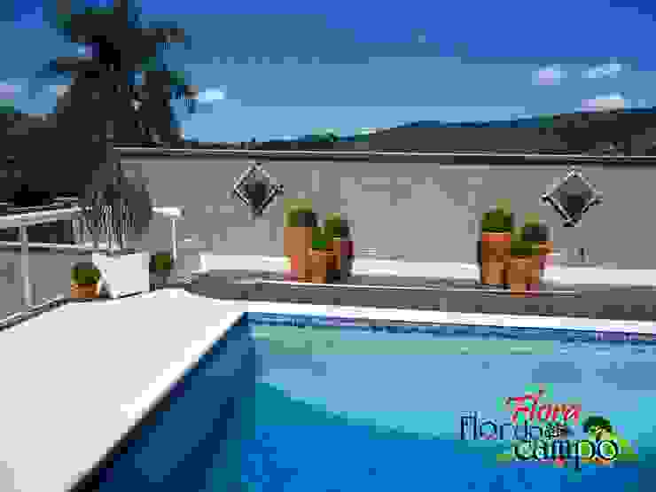 Casa Com Execucao De Paisagismo Com Plantas E Pedras Homify