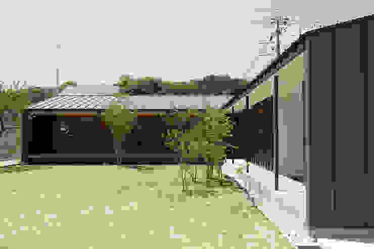 toki Architect design office Casa di legno Metallo Grigio