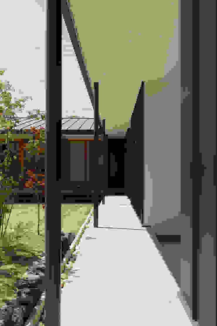 toki Architect design office Casa di legno Ferro / Acciaio Nero