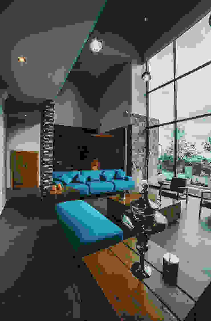 Zona Arquitectura Más Ingeniería Living roomTV stands & cabinets Textile Turquoise