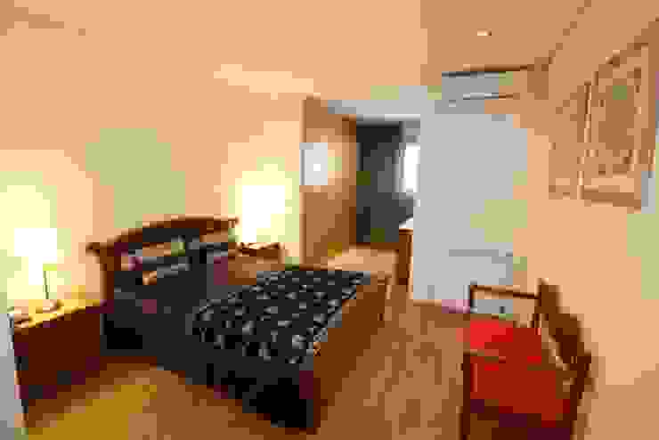 Quarto Suite (1) Quartos rústicos por Clix Mais Rústico