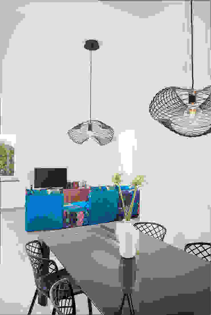 Area Living manuarino architettura design comunicazione Soggiorno minimalista Blu divano,living,mobile tv,open space