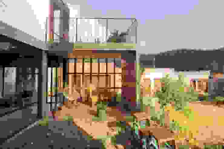 Apaloosa Estudio de Arquitectura y Diseño منزل عائلي صغير الطوب Orange