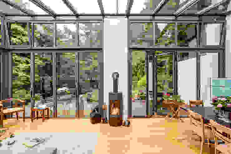 Wintergarten und Bad für ein Backsteinhaus EMBERT Raumkonzept INNENARCHITEKTUR Moderner Wintergarten wintergarten