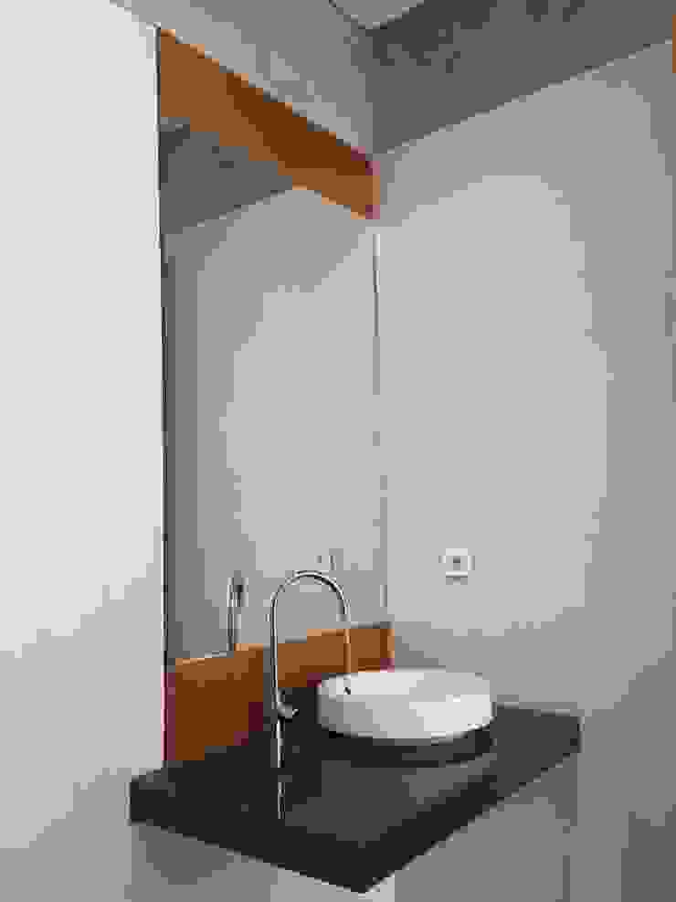 indra firmansyah architects Industrial style bathrooms